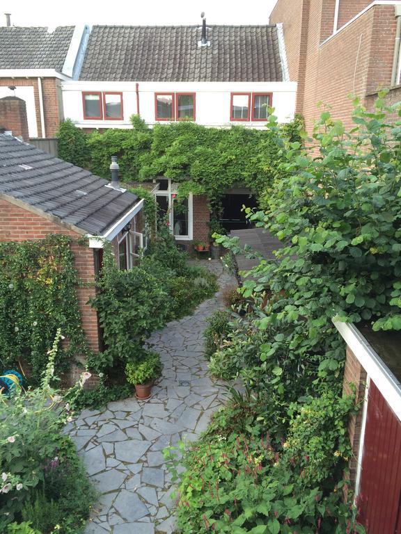 Gastenverblijf Door De Poort Tilburg Esterno foto